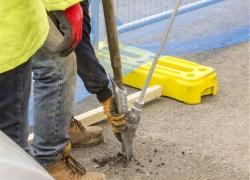 Earth Anchor being driven into the ground