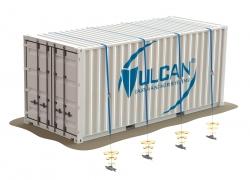 Container anchored down to the ground with straps and mechanical earth anchors